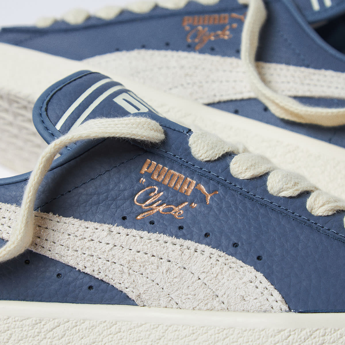 Puma white with hot sale blue stripe