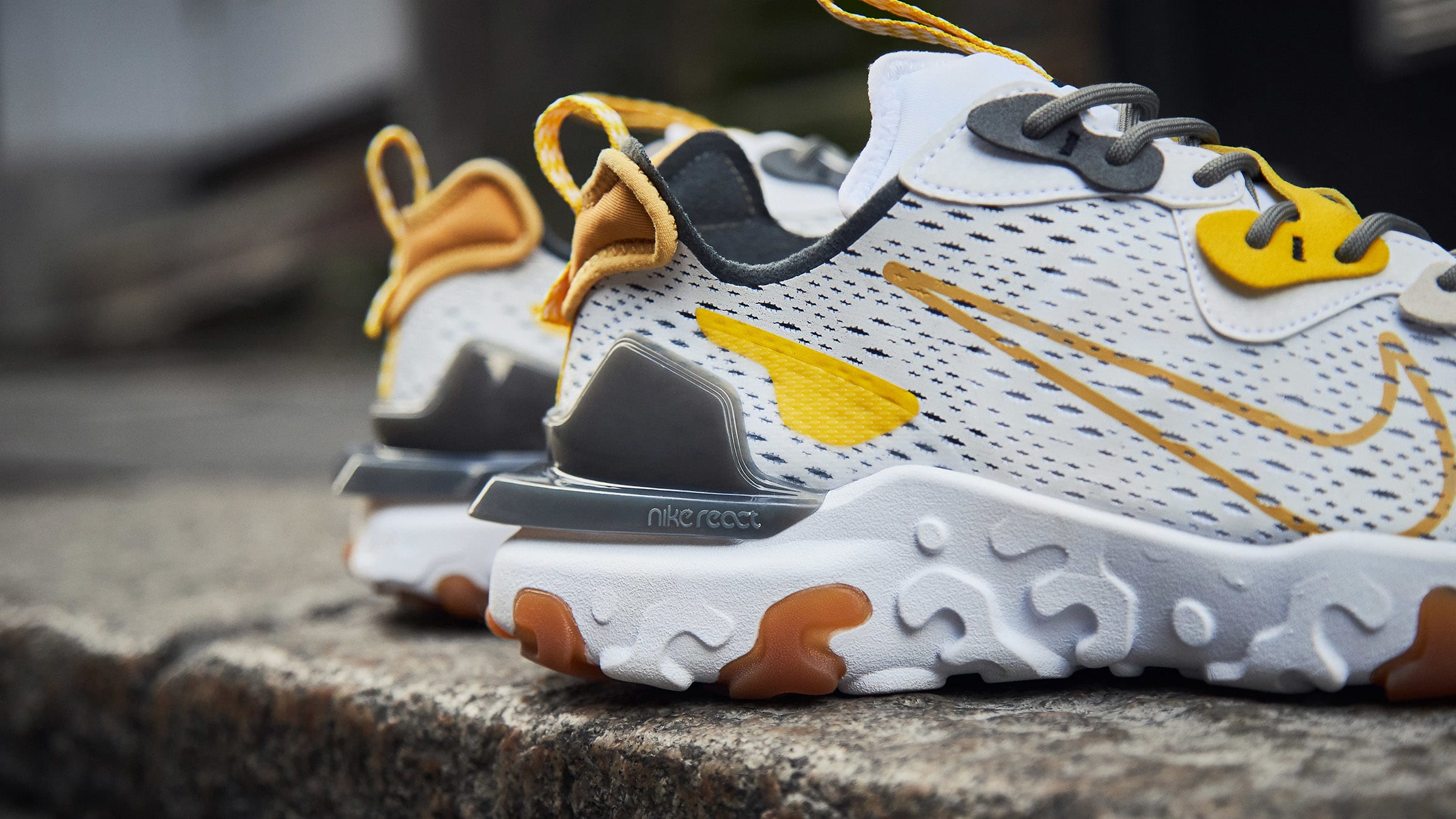 black and yellow nike react