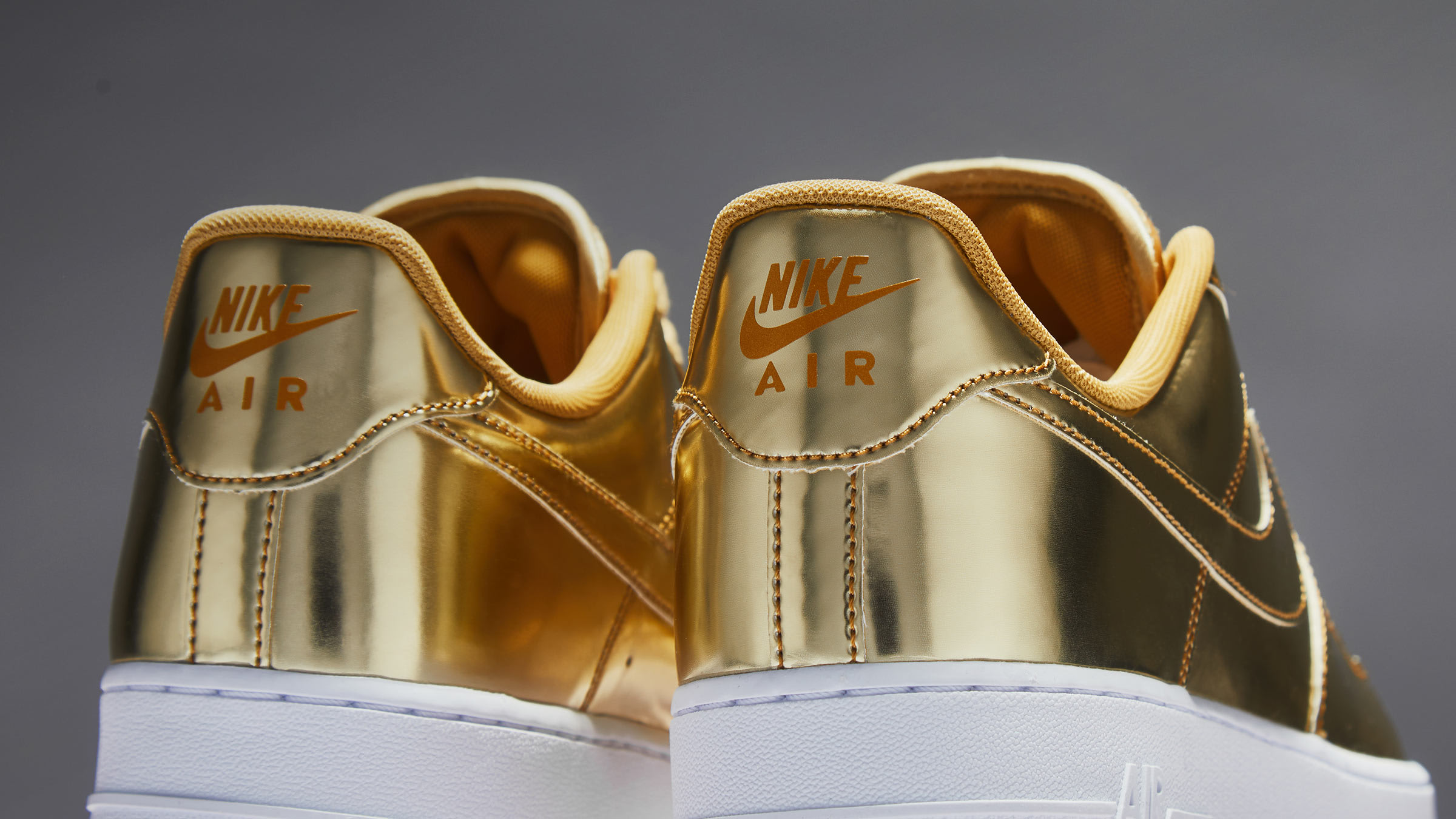 nike air force 1 sp metallic gold