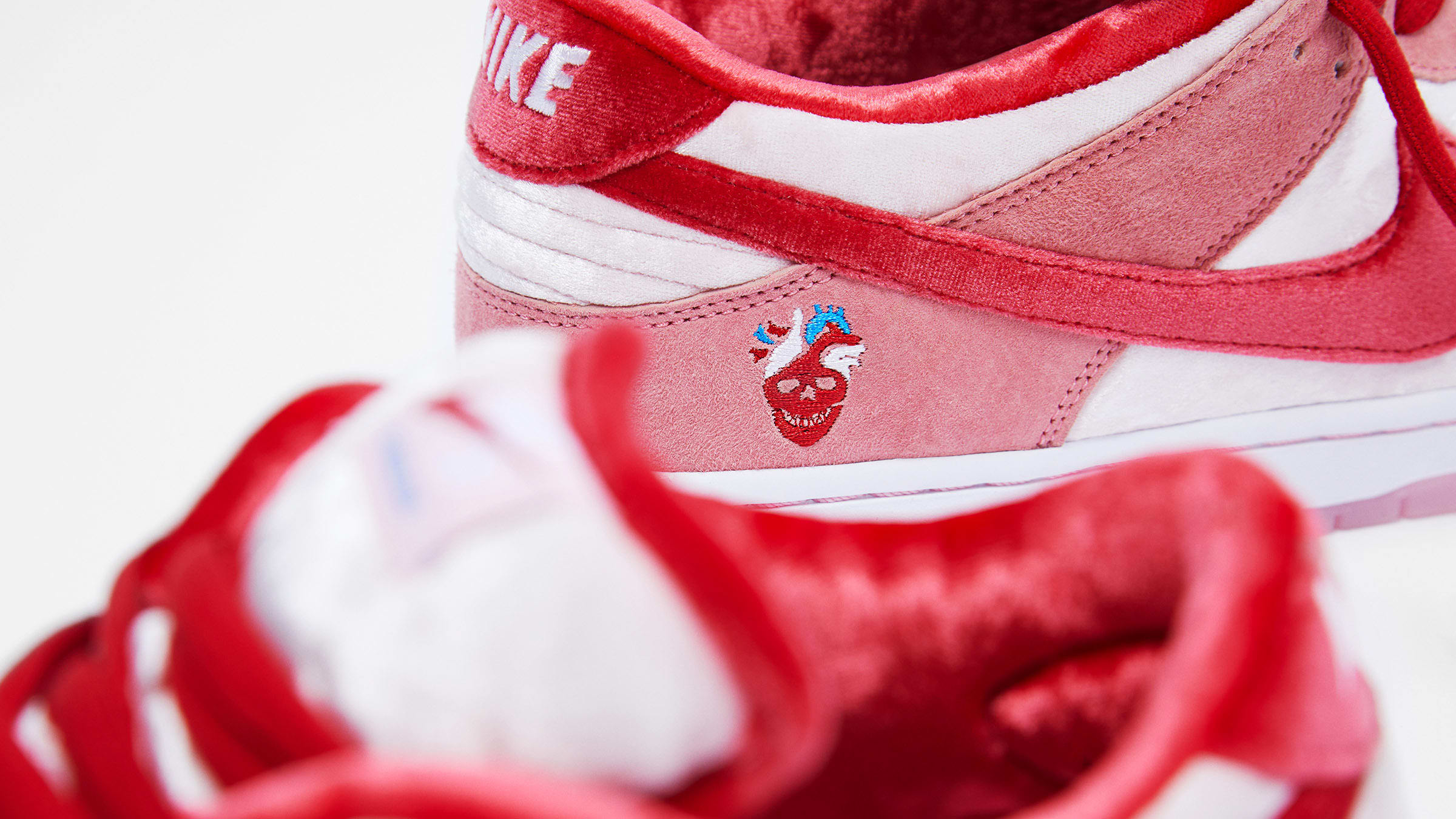 Nike SB x Strangelove Dunk Low Pro (Bright Melon & Gym Red) | END. Launches