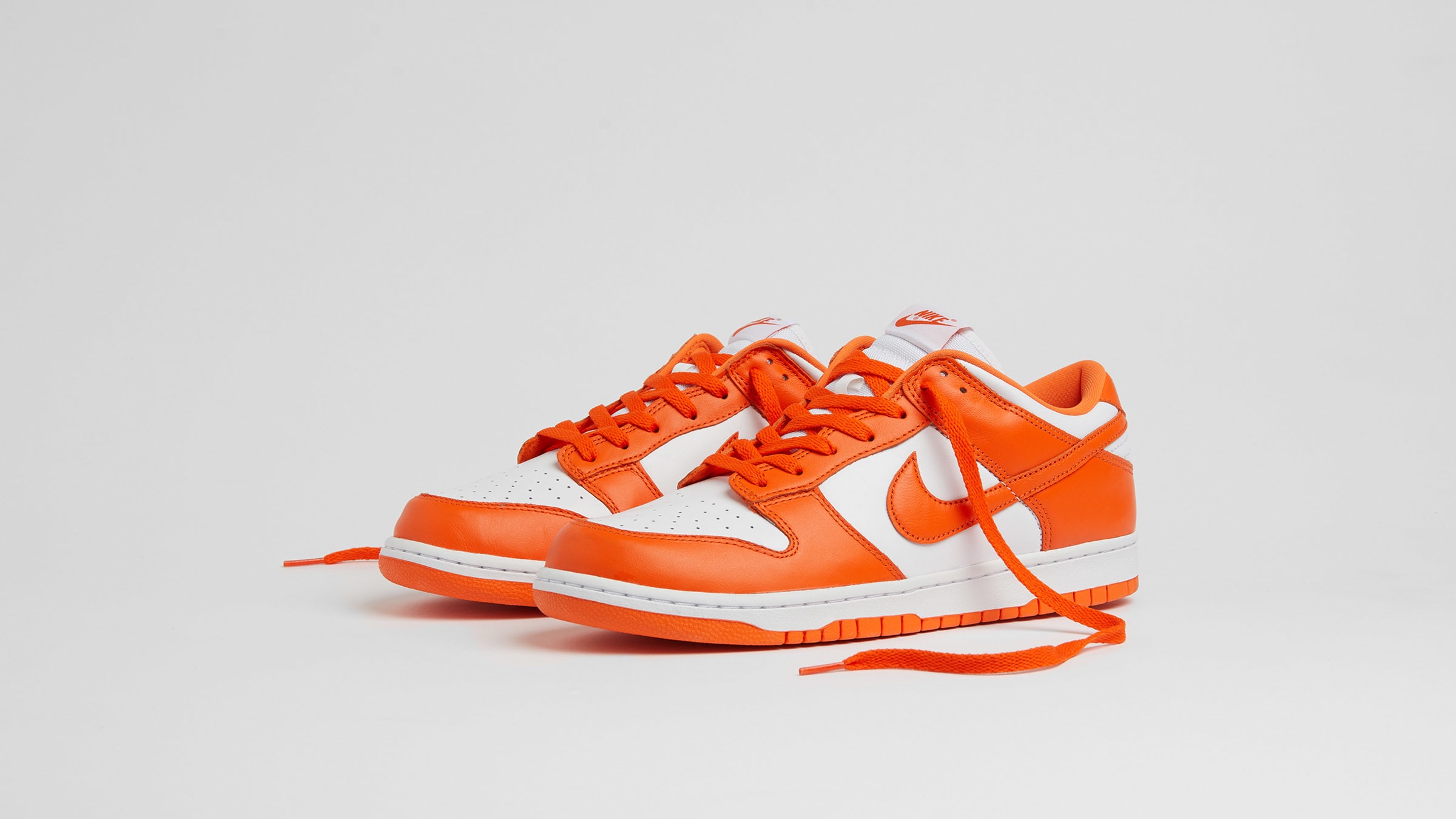 orange & white dunks low