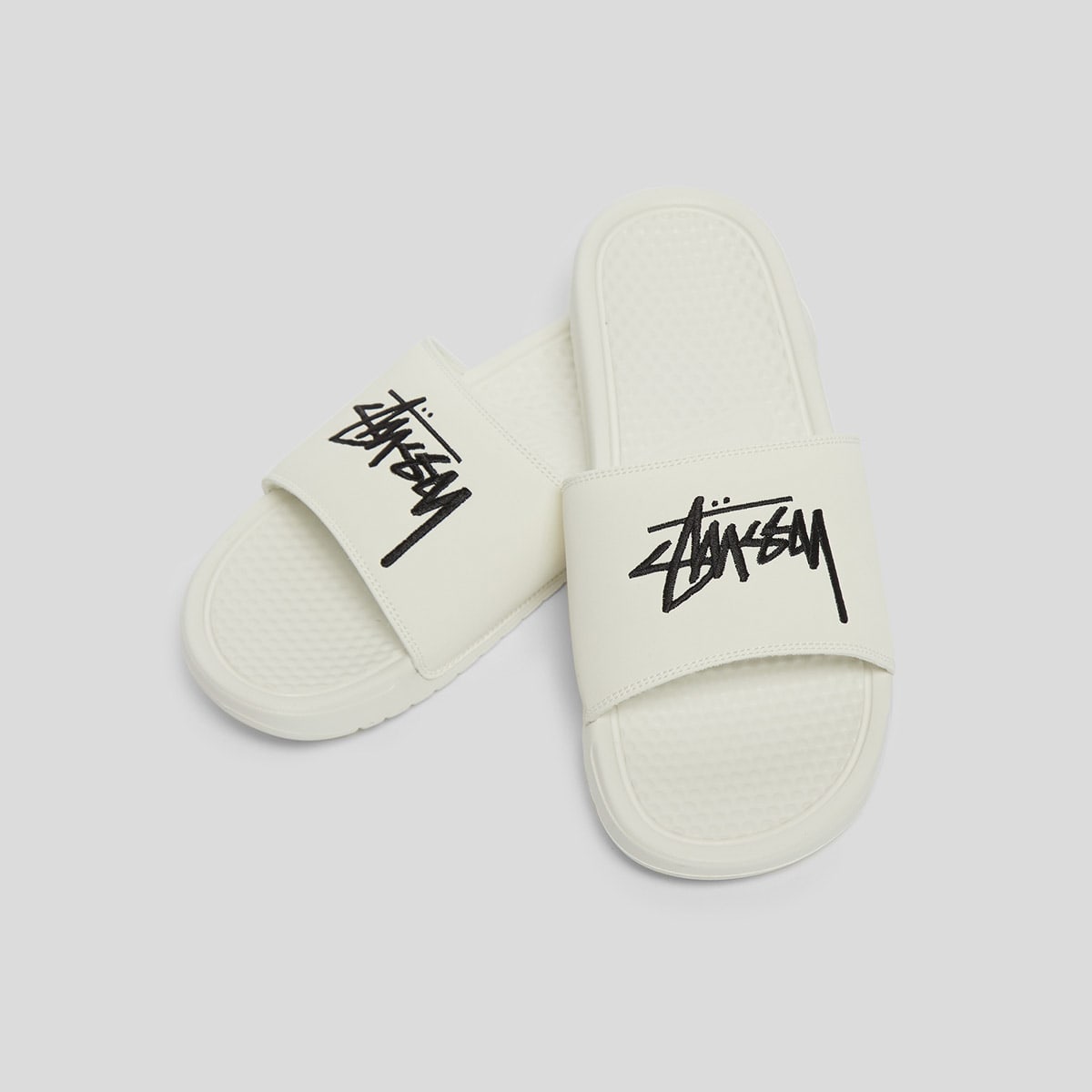 nike benassi x stussy price