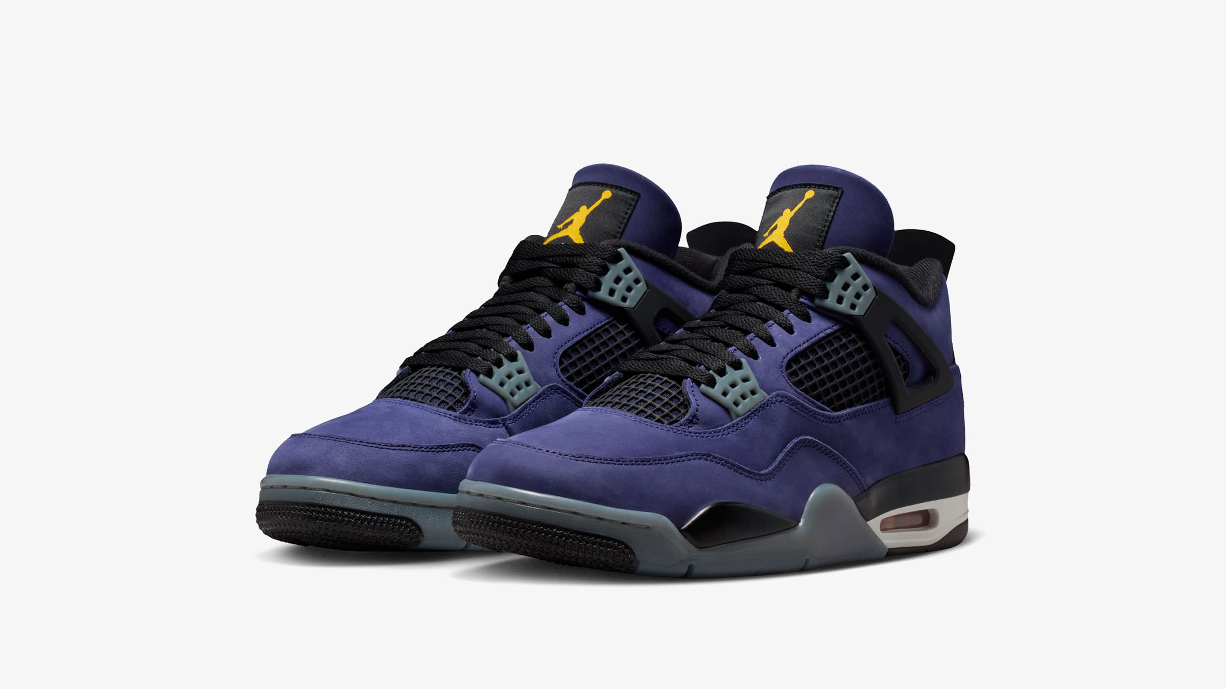 Air Jordan 4 Lakers Imperial Purple lateral view showing black netting and purple nubuck
