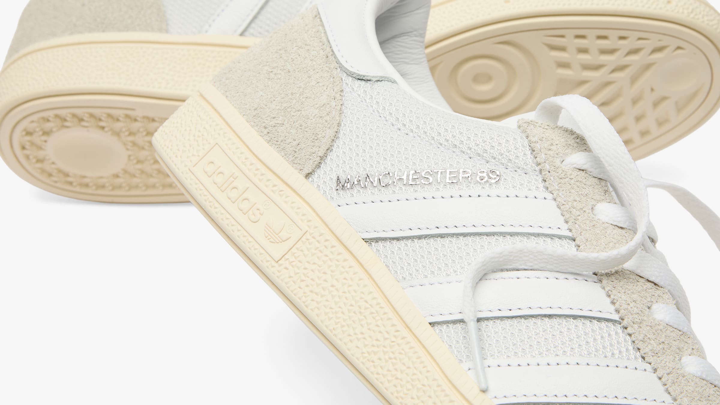 END. x adidas Made in Germany Manchester 89 JR1835 heel and sidewall detail with silver Manchester 89 text