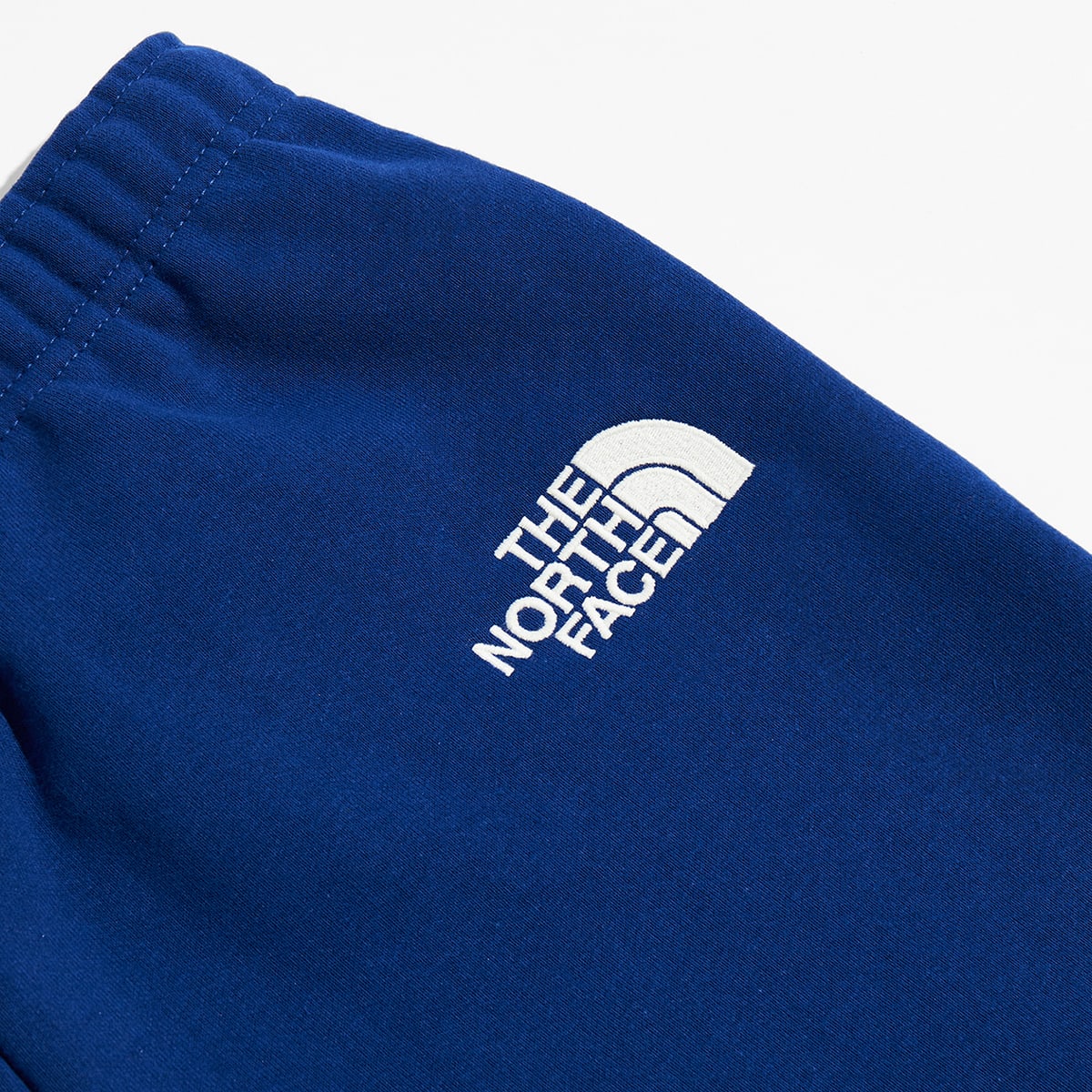 The North Face XX KAWS Sweat Pant (Bolt Blue) | END. Launches
