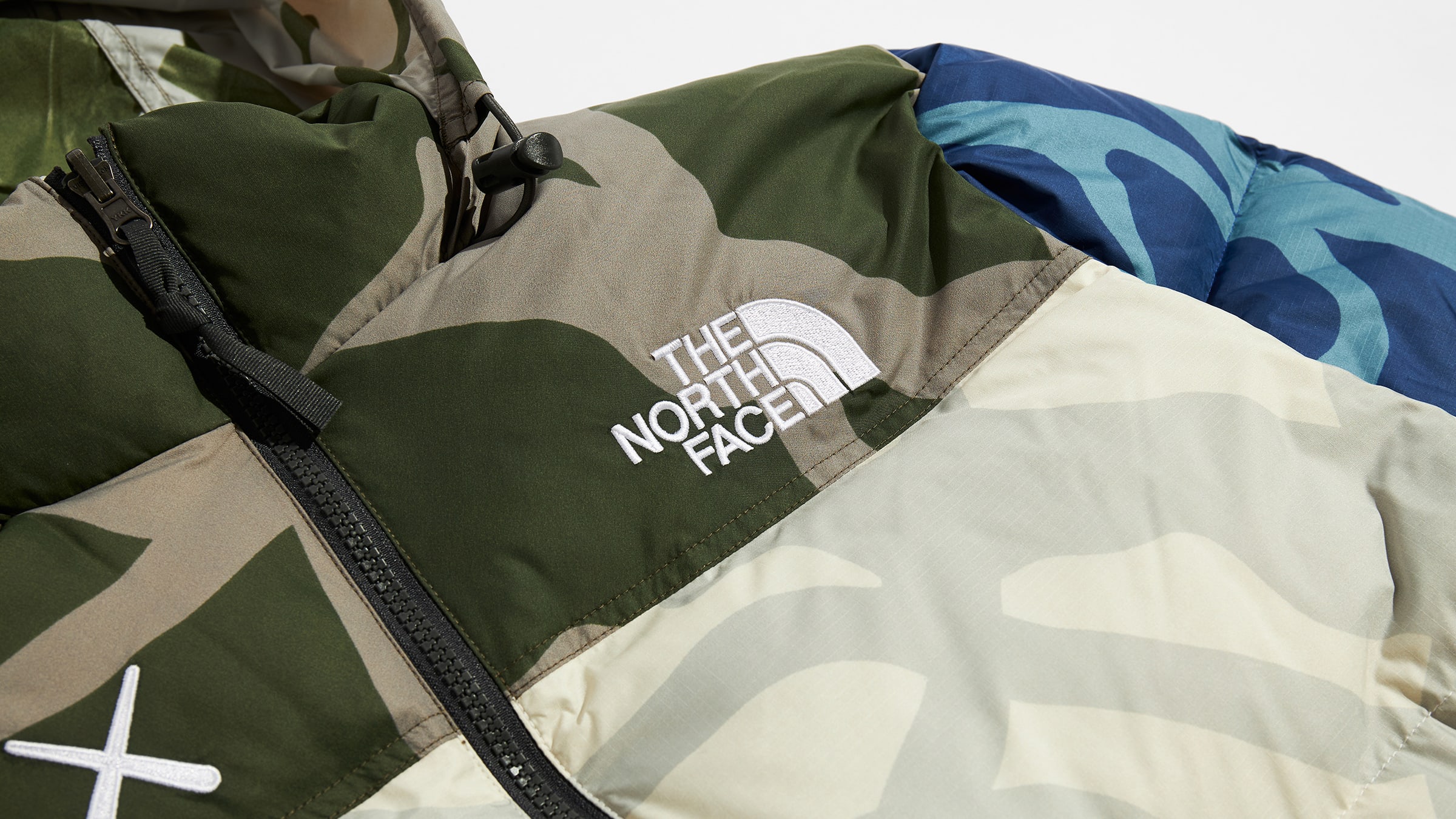 The North Face XX KAWS Retro 1996 Nuptse Jacket (Moonlight Ivory Nuptse ...